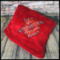 Supernatural red embroidered blanket