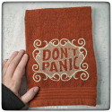 Serviette brodée don't panic