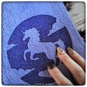 Serviette brodée licorne